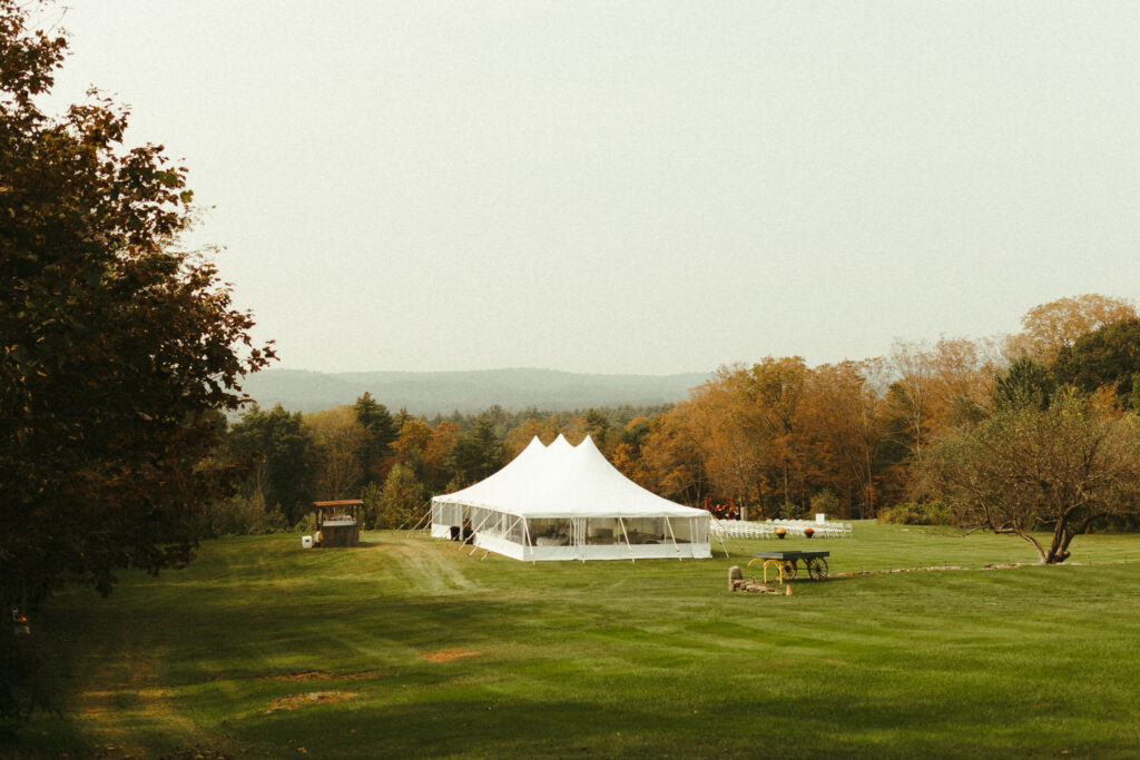 Choosing your wedding venue. Reception tent in field.