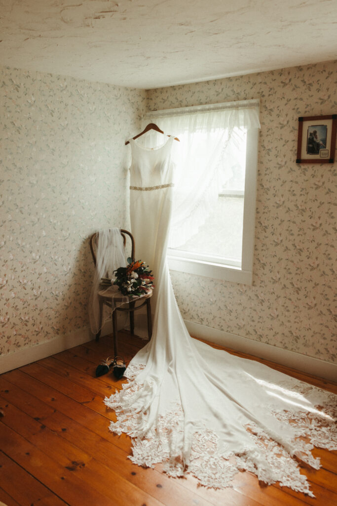 Dress hanging in wedding venue bridal suite