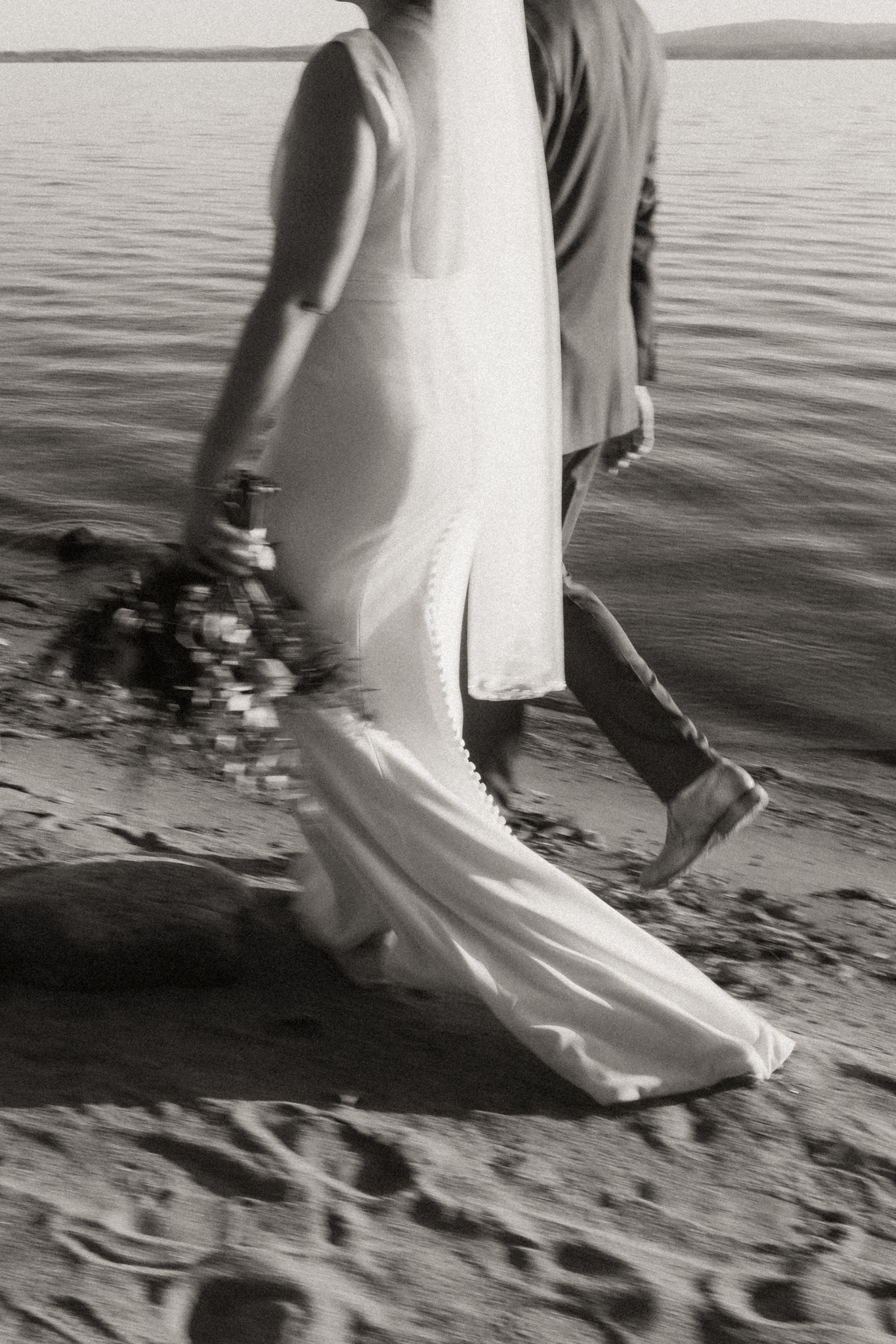 Motion blur of bride and groom walking