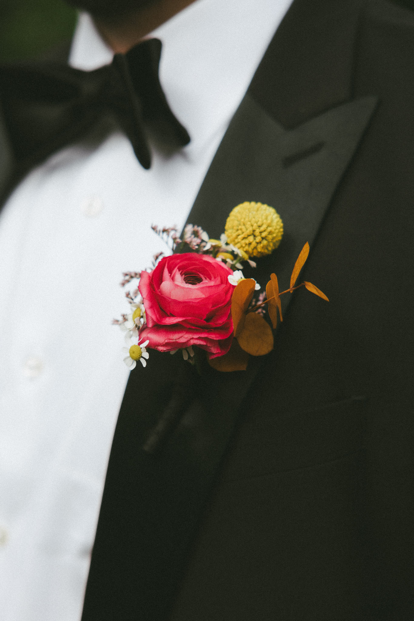 Groom's boutonniere pink yellow