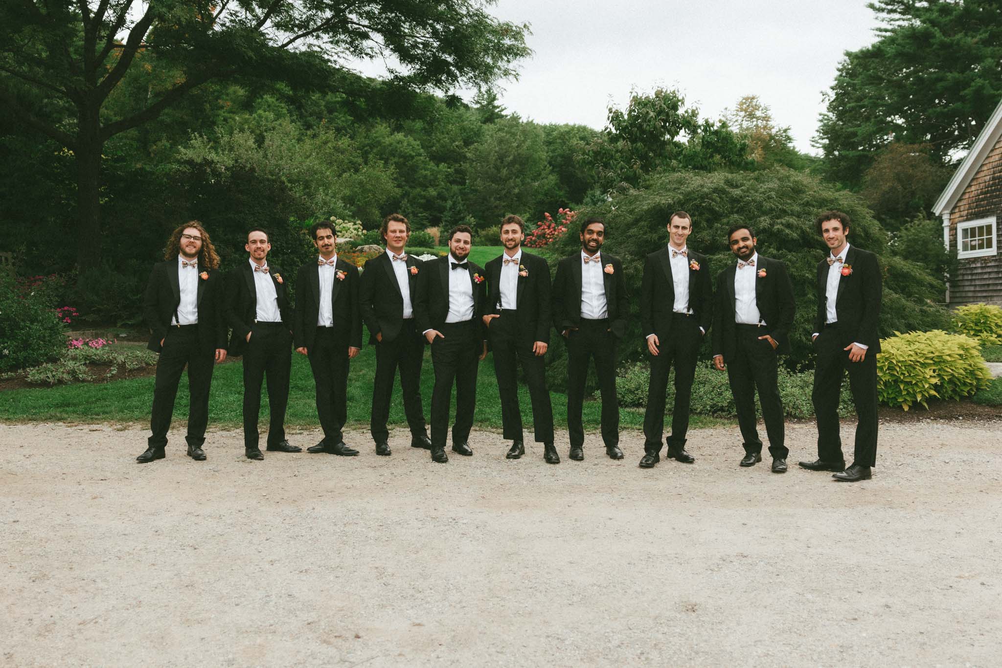 groom and groomsmen at the gardens at Uncanoonuc