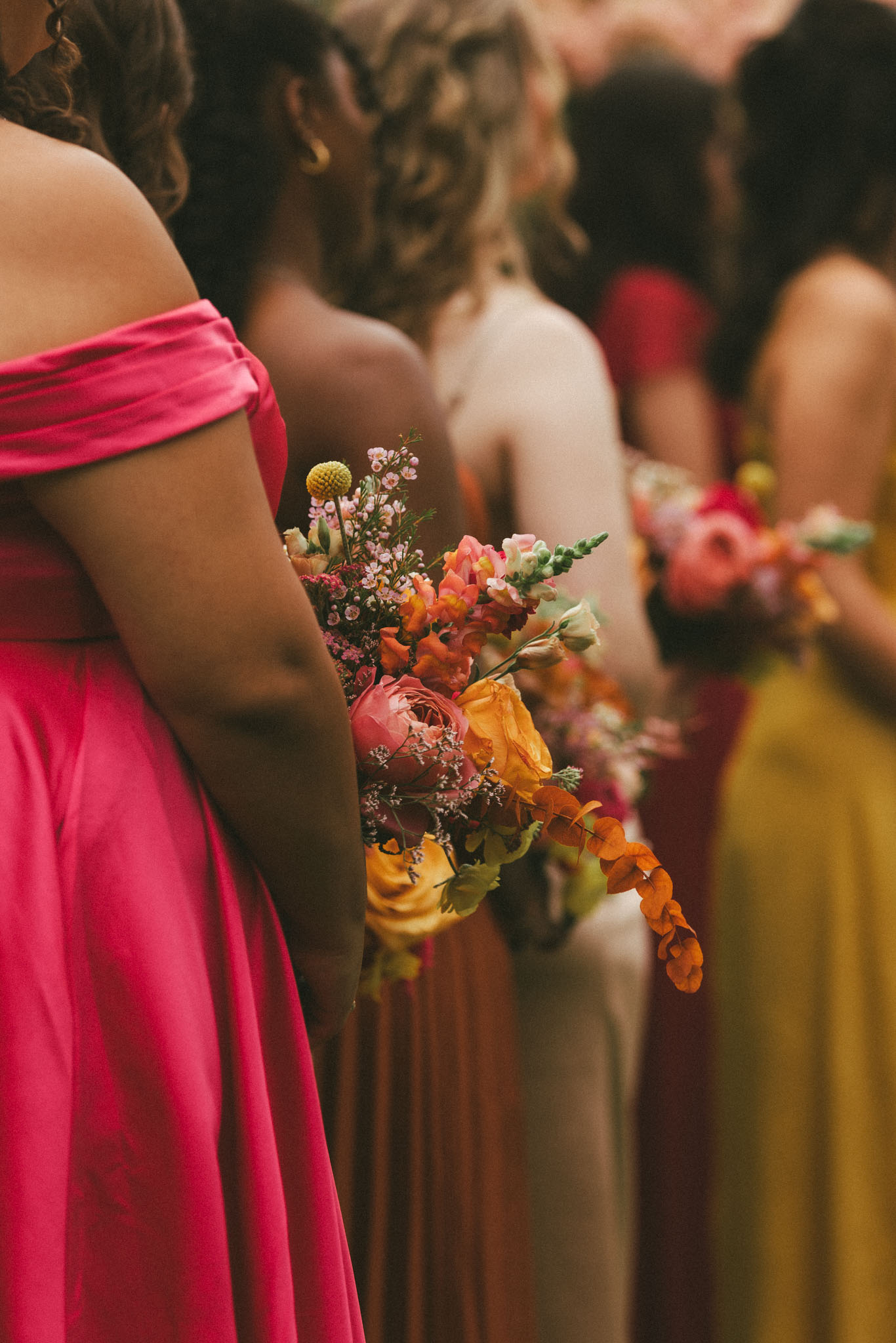 Bridesmaid with hot pink flowers