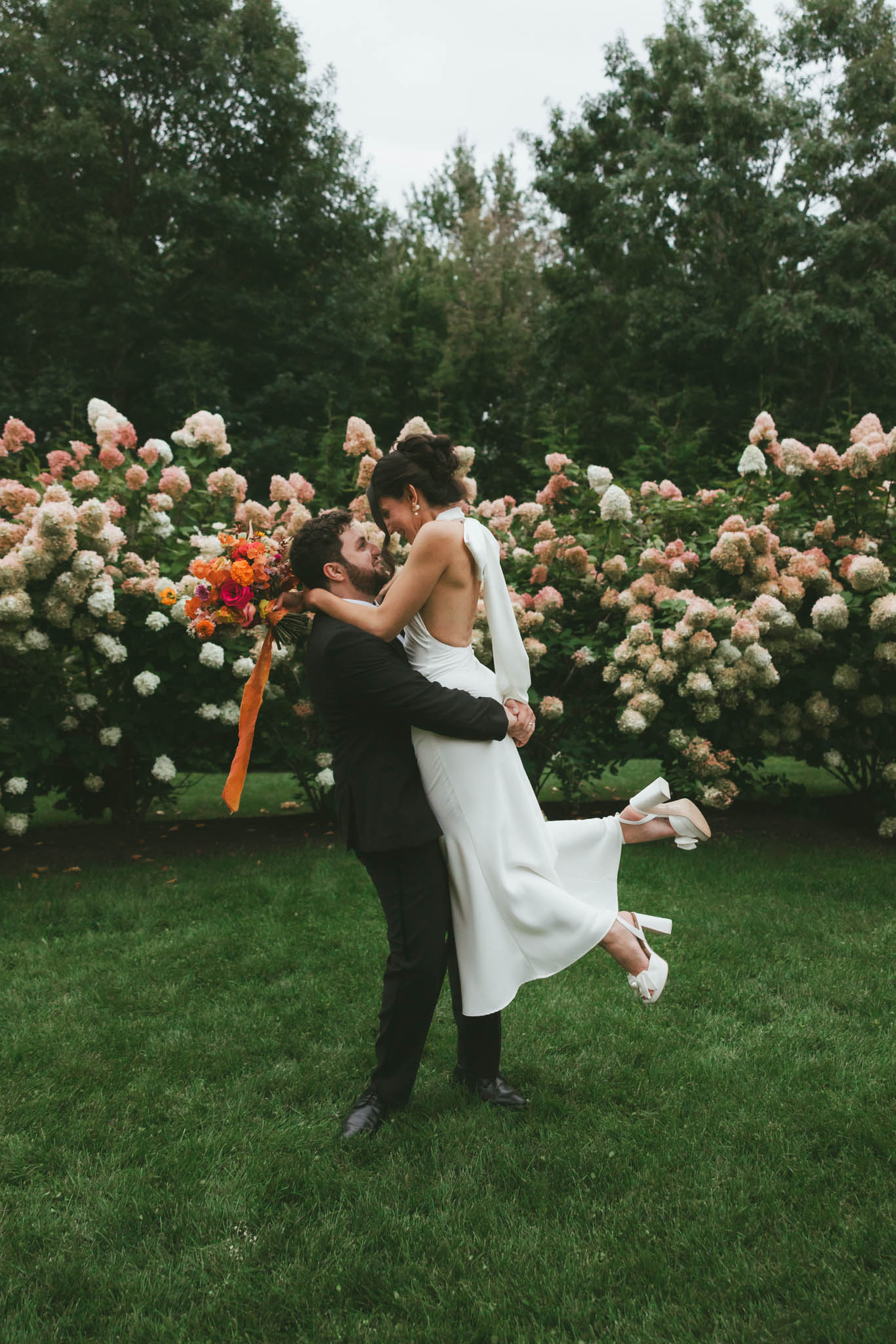 Bride and groom in garden